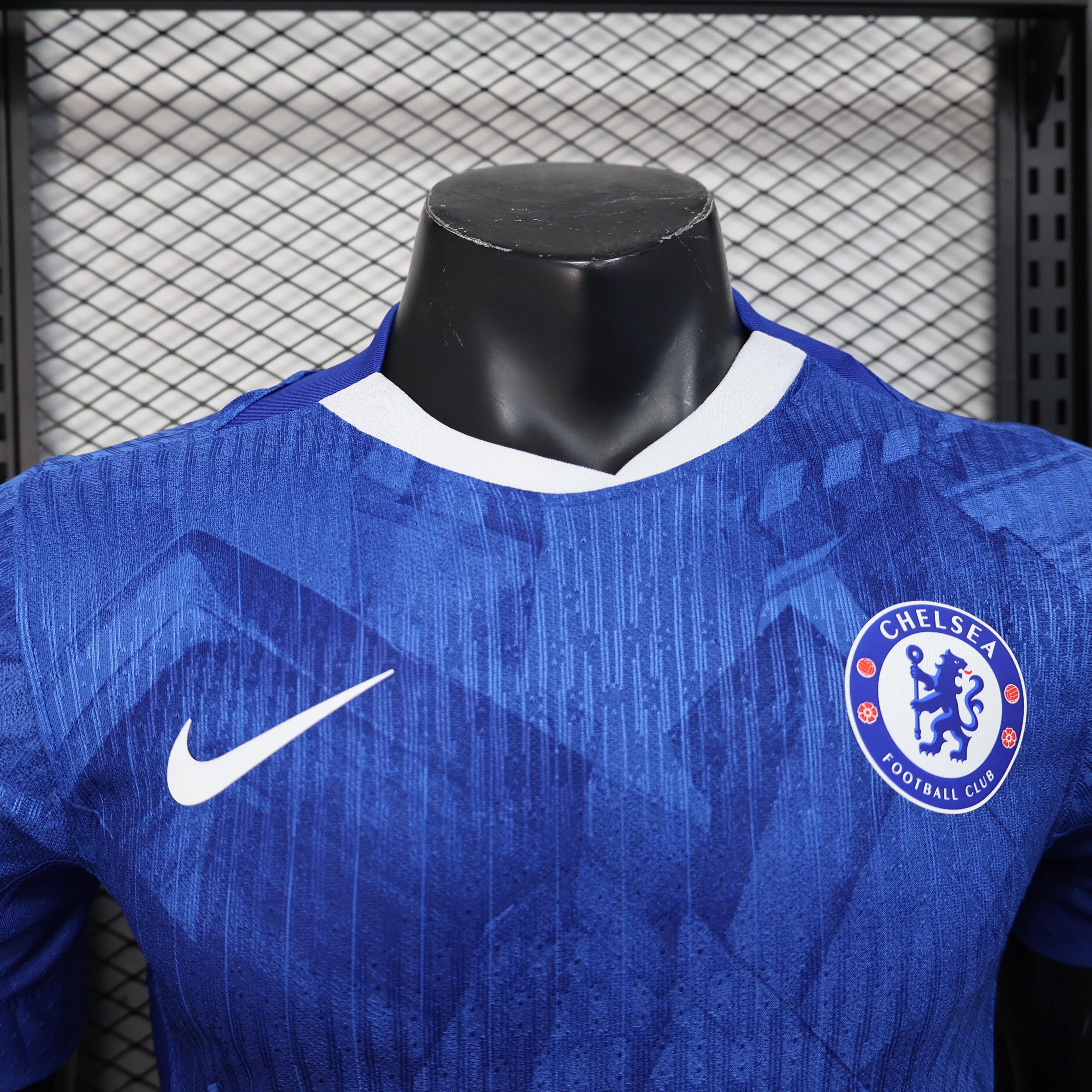 Blue Chelsea 25/26 home player jersey with Nike swoosh, crest, texture