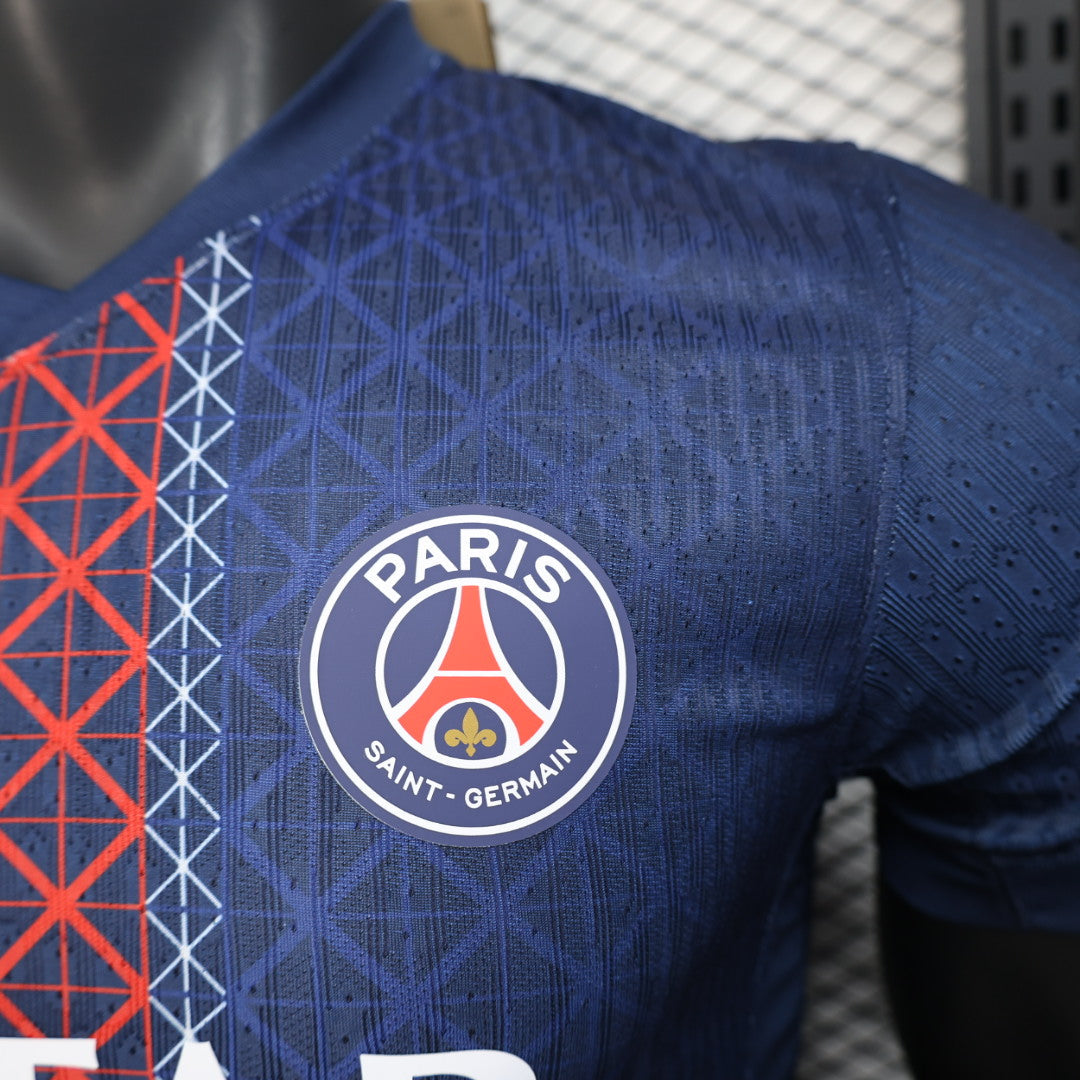Deep navy blue PSG 25/26 player home jersey with textured fabric and crest