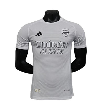 White Arsenal 25/26 player training jersey with black adidas logo