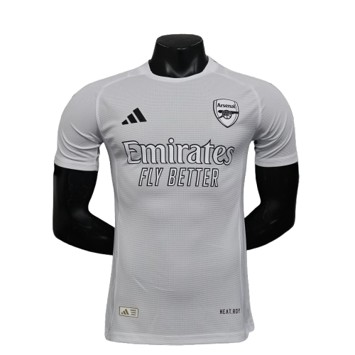 White Arsenal 25/26 player training jersey with black adidas logo