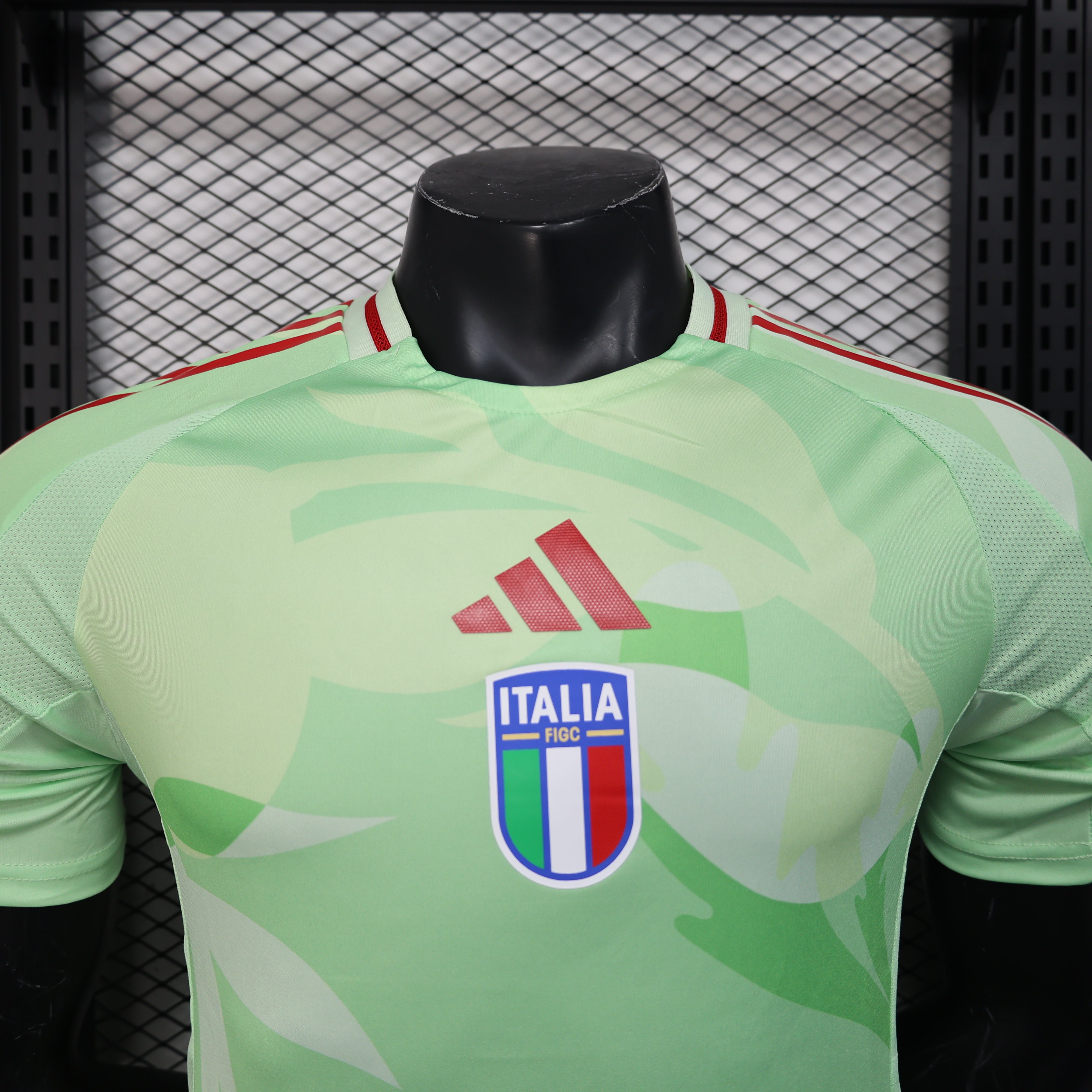 Light green white camo Adidas Italy 25/26 GK jersey with red shoulder stripes