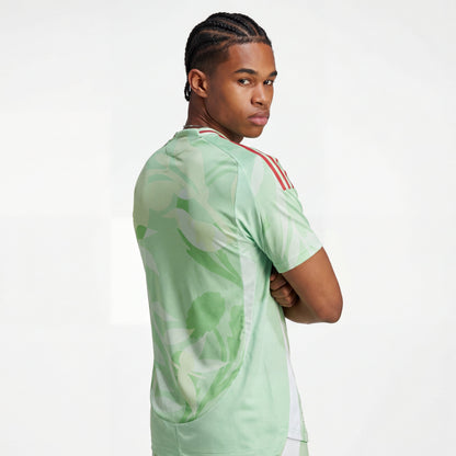 Light green Italy 25/26 player training jersey with floral pattern, red shoulder stripes