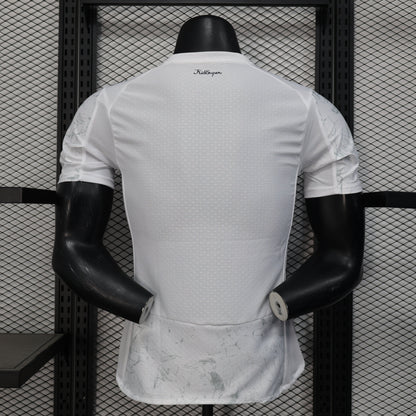 Back of Manchester City 25/26 away jersey with marble pattern and mesh panels